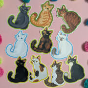 A photo of 10 stickers featuring illustrations of various short haired cat colors and patterns, illustrated by Ayumutan Art